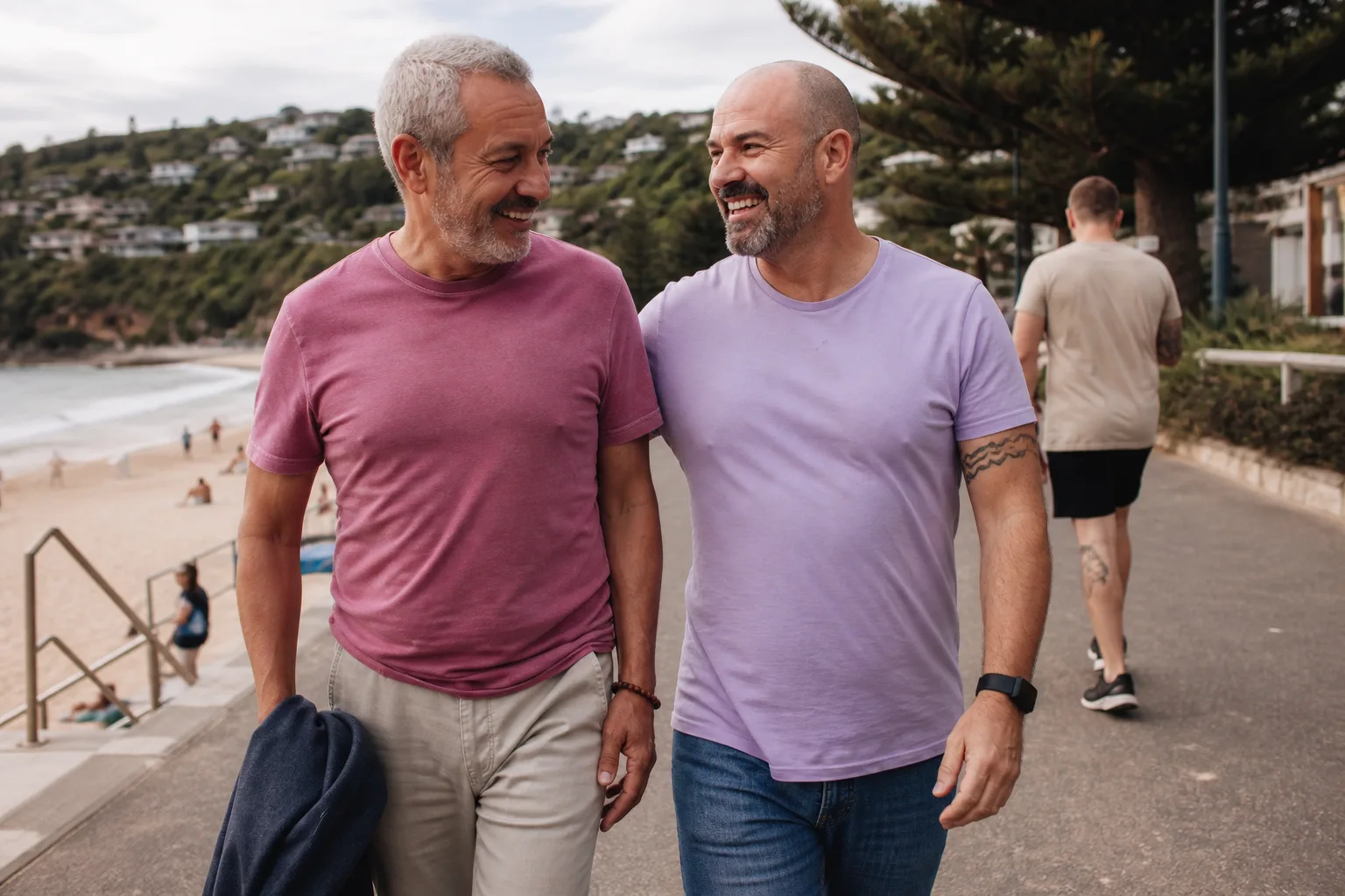 Two gay men chatting beside Bournemouth seafront